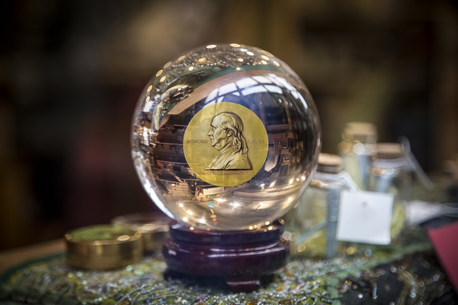 Pulitzer prize floating in a crystal ball