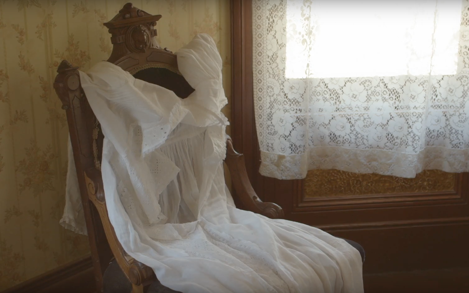 An abandoned white dress, screenshot from Wild Nights with Emily