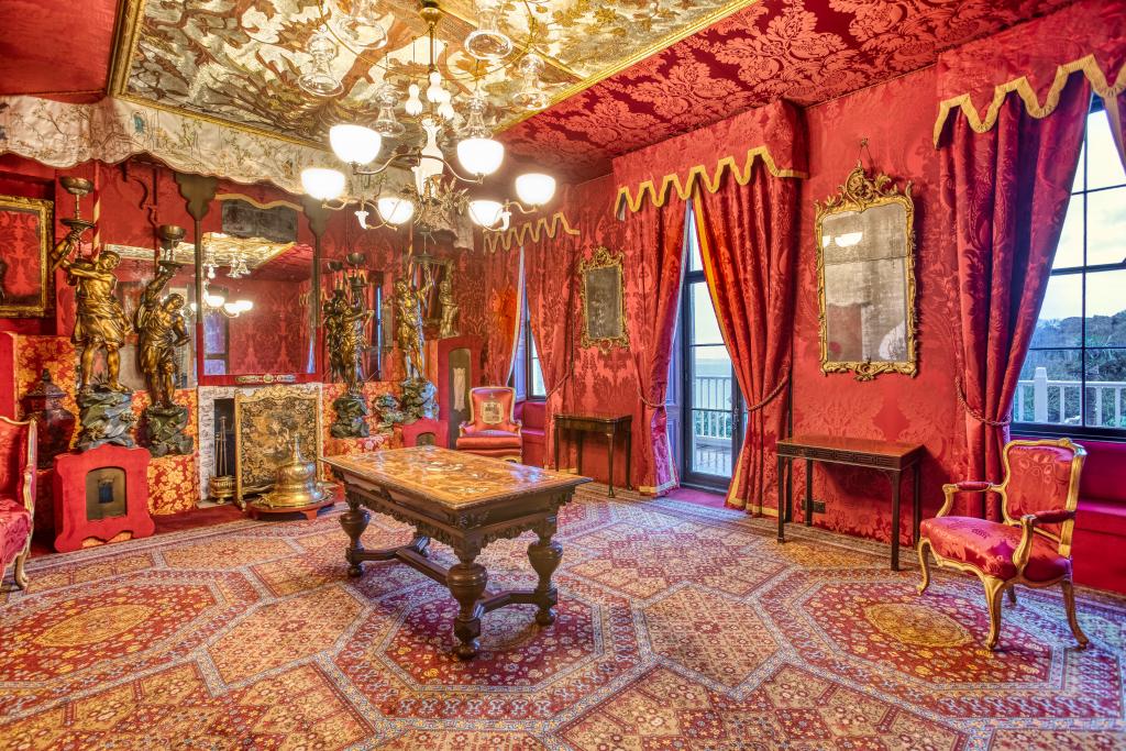 Ornately decorated red room in Hauteville House
