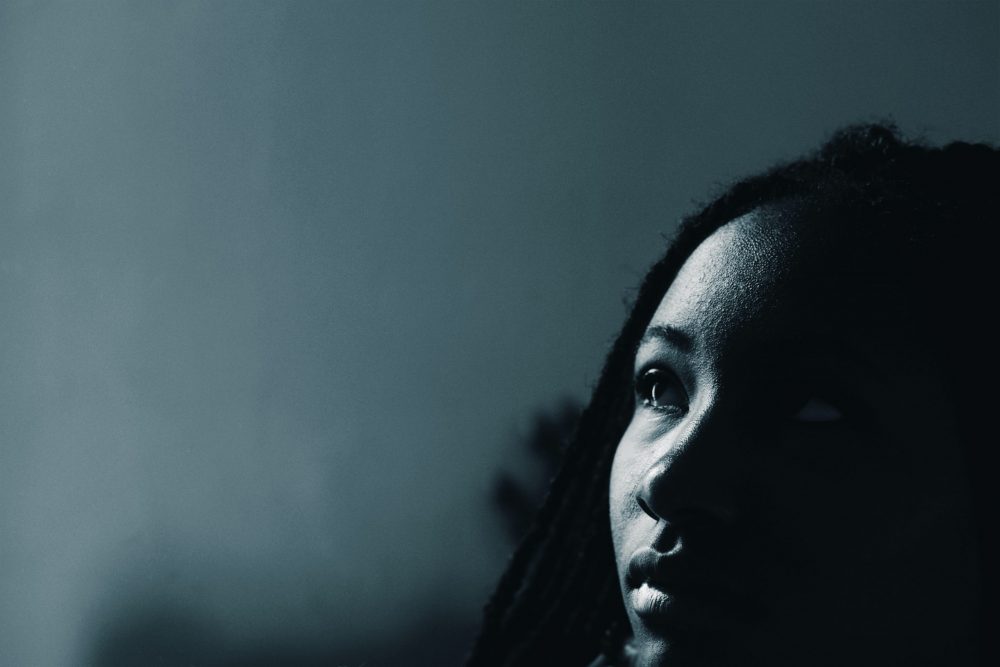 Black girl in monochrome looking serious