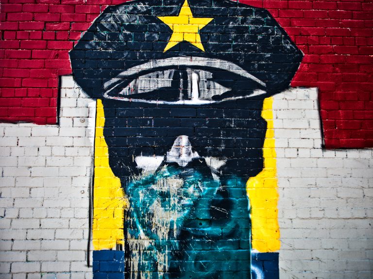 Painting of a policeman on a wall