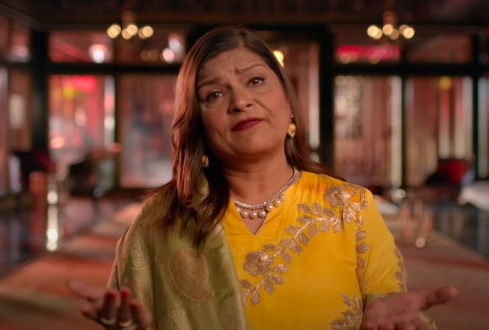 Matchmaker Sima Taparia in yellow sari