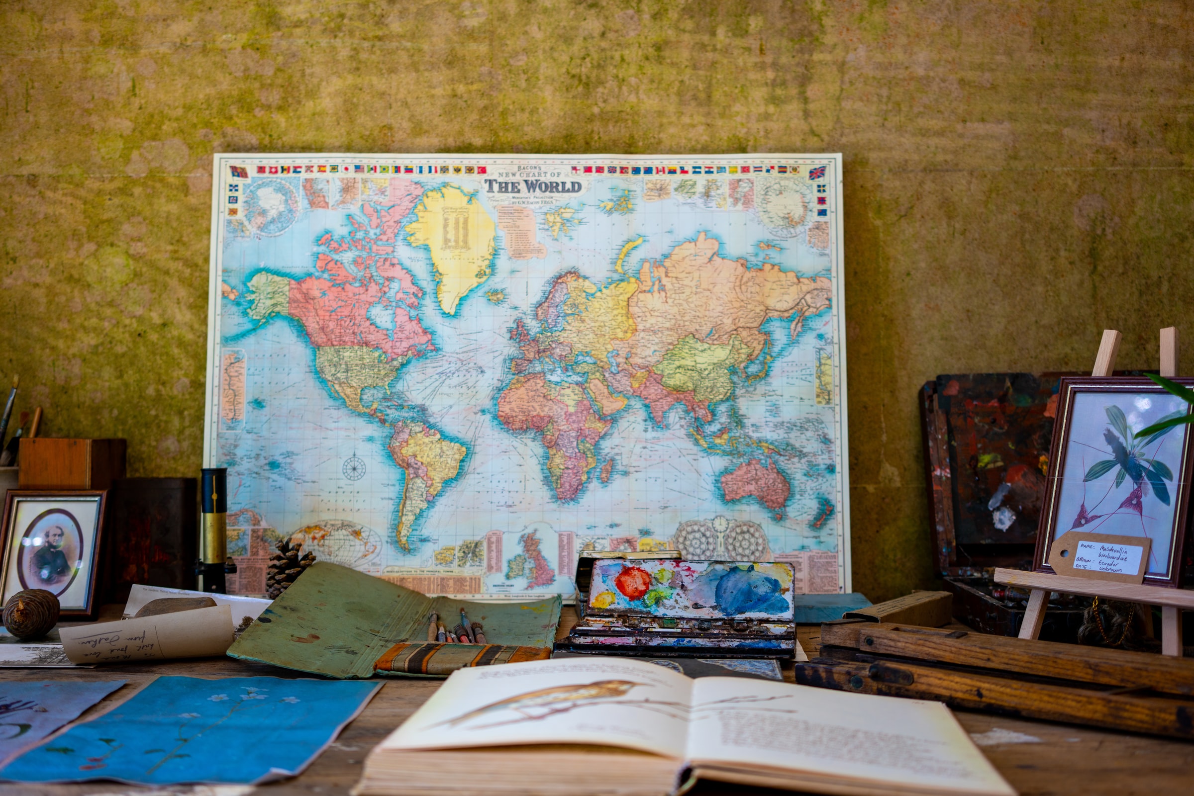 World map with book in front