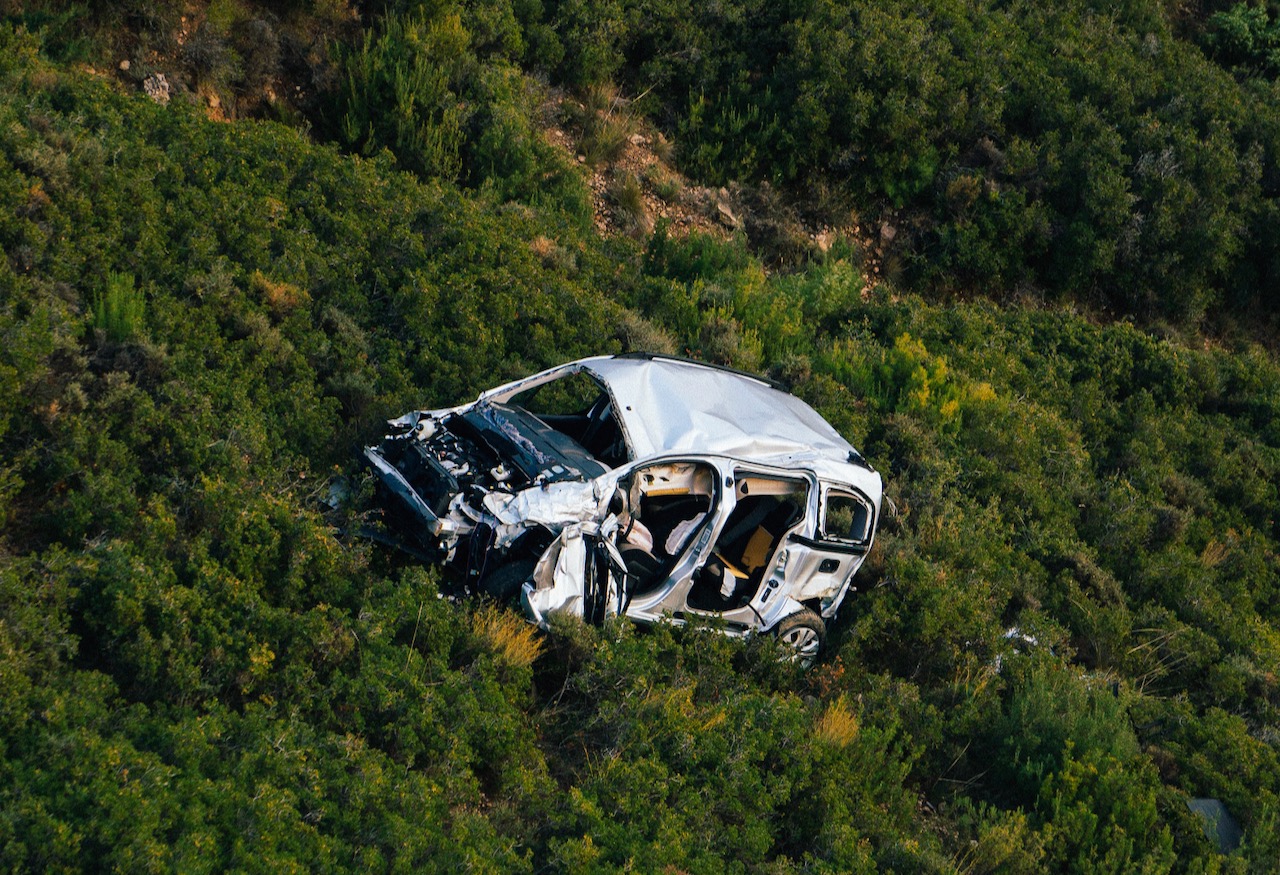 A car wreck in a field