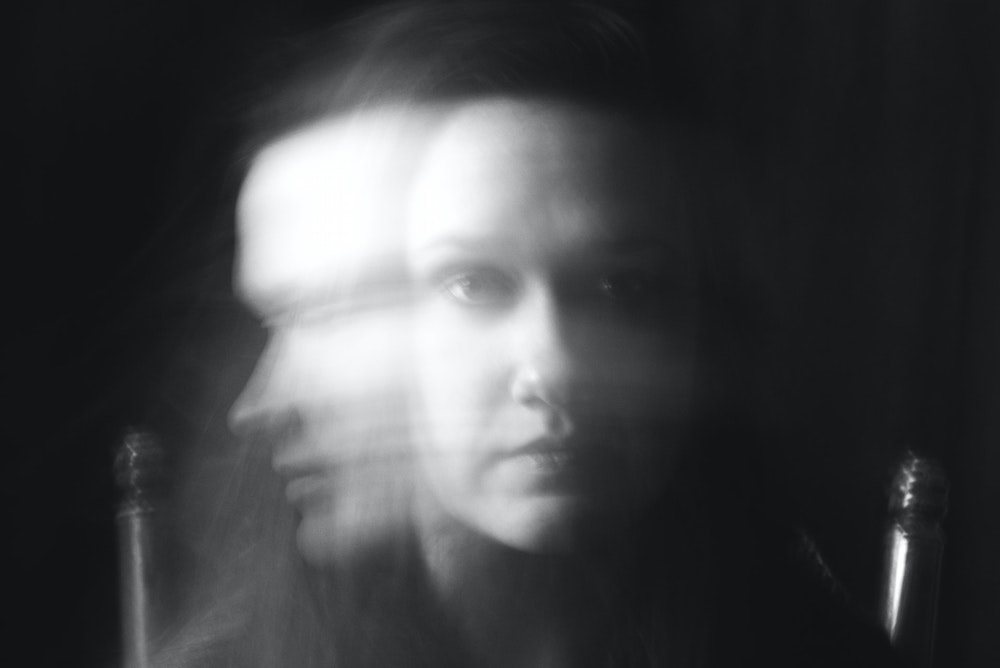 Woman's face blurred by movement