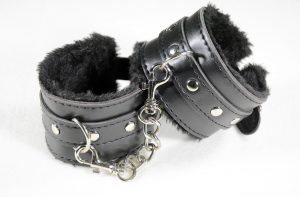 Furry black leather cuffs