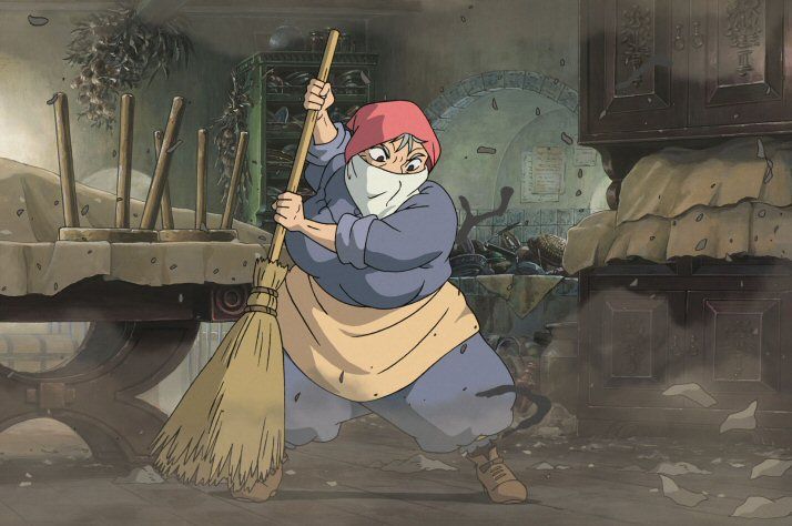 An old woman furiously sweeping a very filthy castle