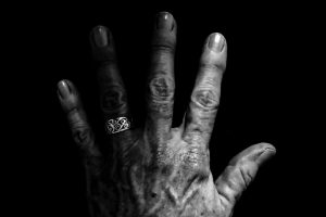 Old woman's hand in black and white