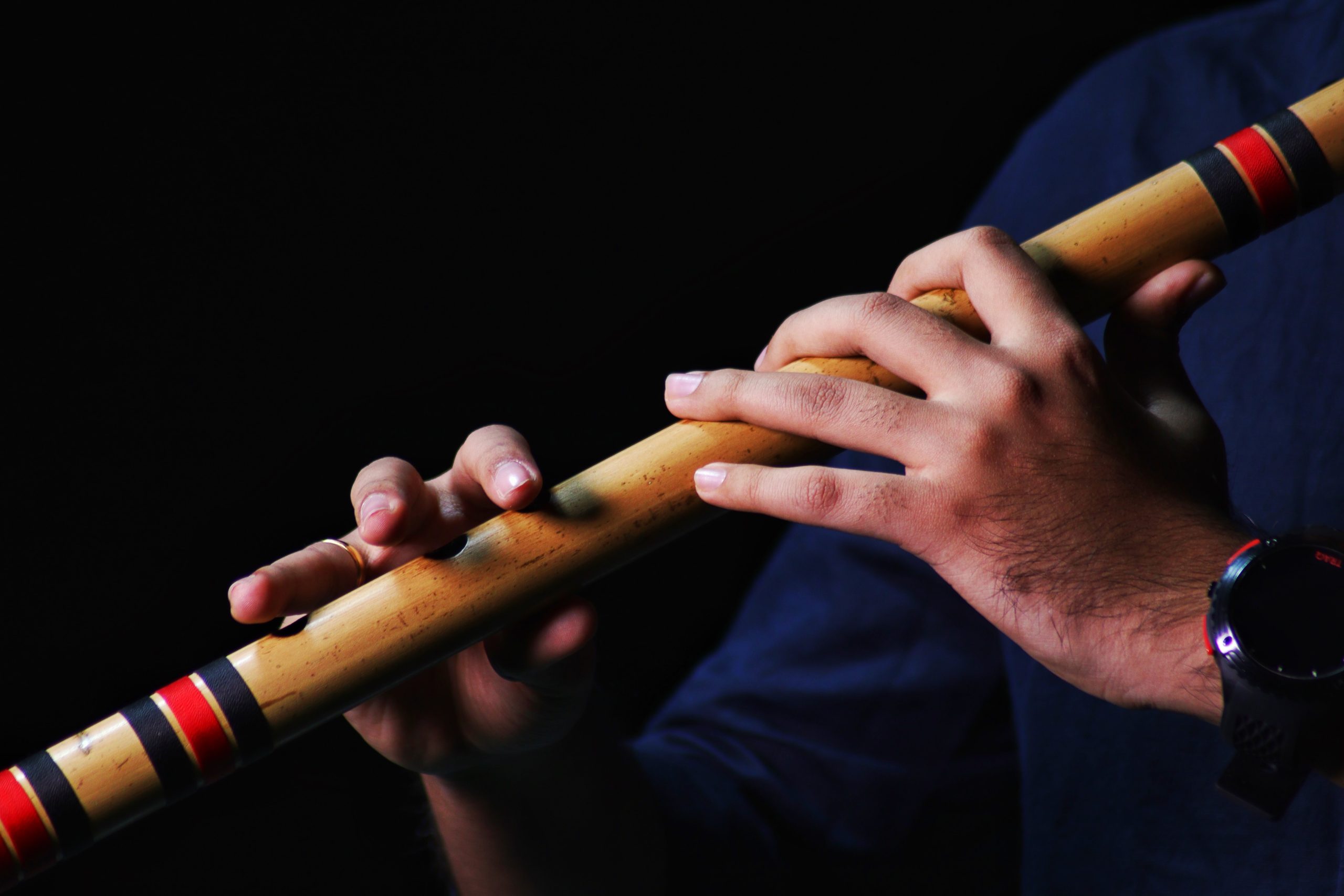 wooden flute and hands