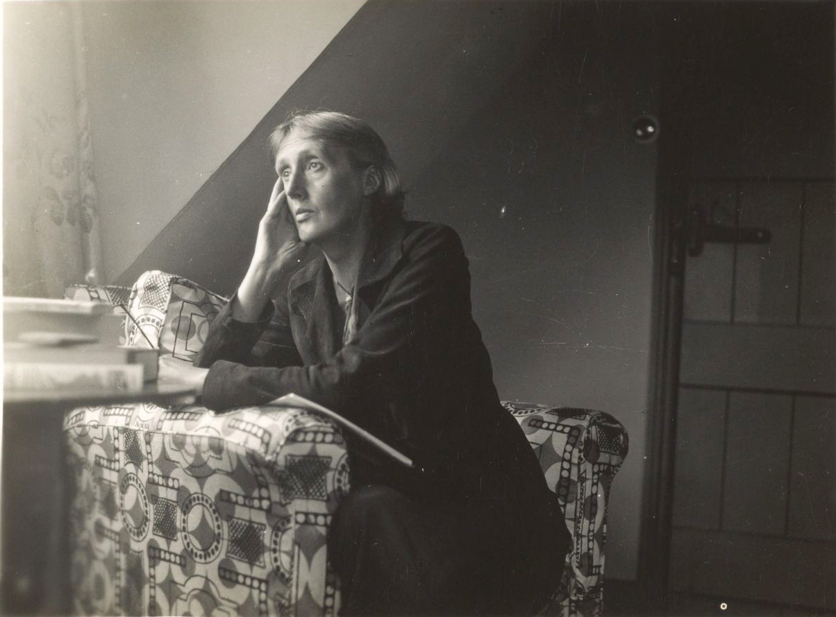 Virginia Woolf at a table